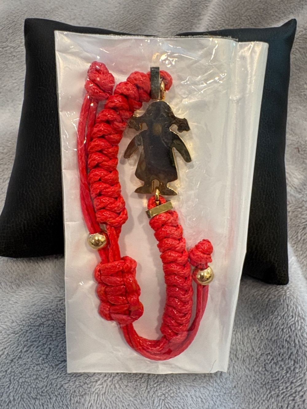 Handwoven Red Braided Bracelet with Gold Penguin Charm